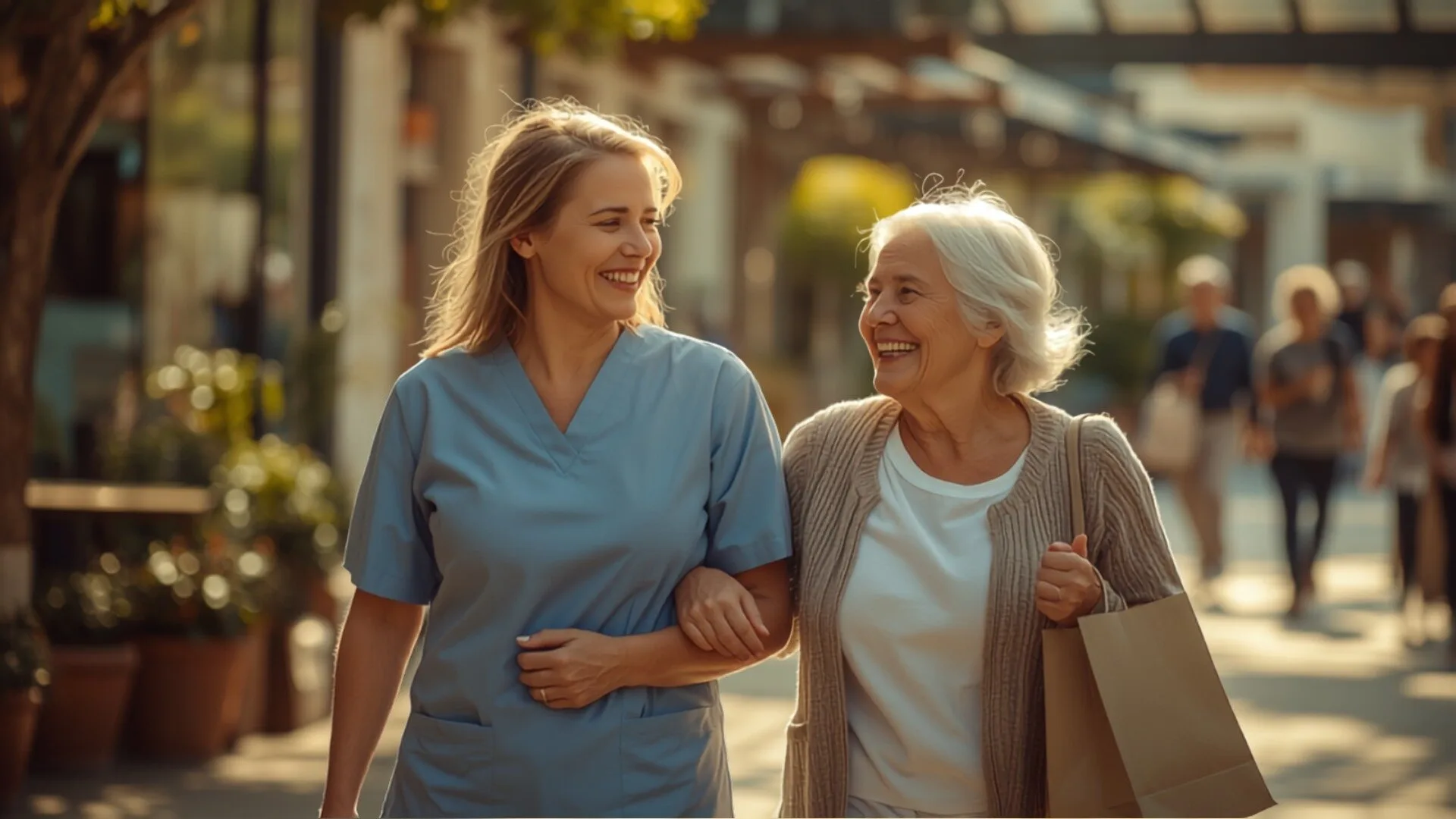 Angels Over Us caregiver walking arm-in-arm with a Central Illinois senior on a shopping outing